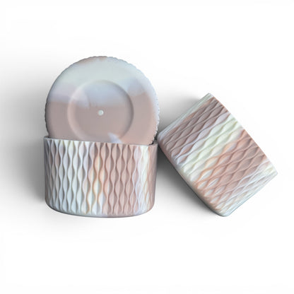 Next Nirvana matte almond rose bay silicone tumbler boot and 3D wave textured straw topper set for 20-40oz cups.