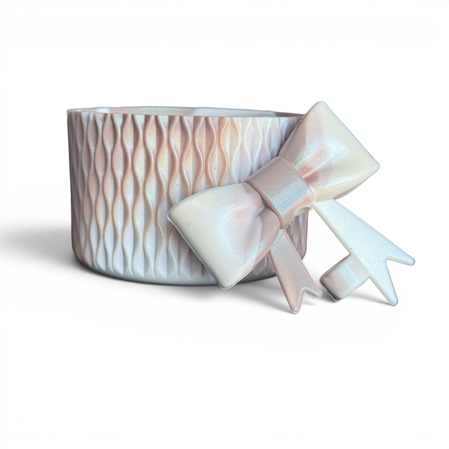 Next Nirvana Almond Rose Bay shimmer silicone tumbler boot and 3D bow straw topper set with a textured wave design.
