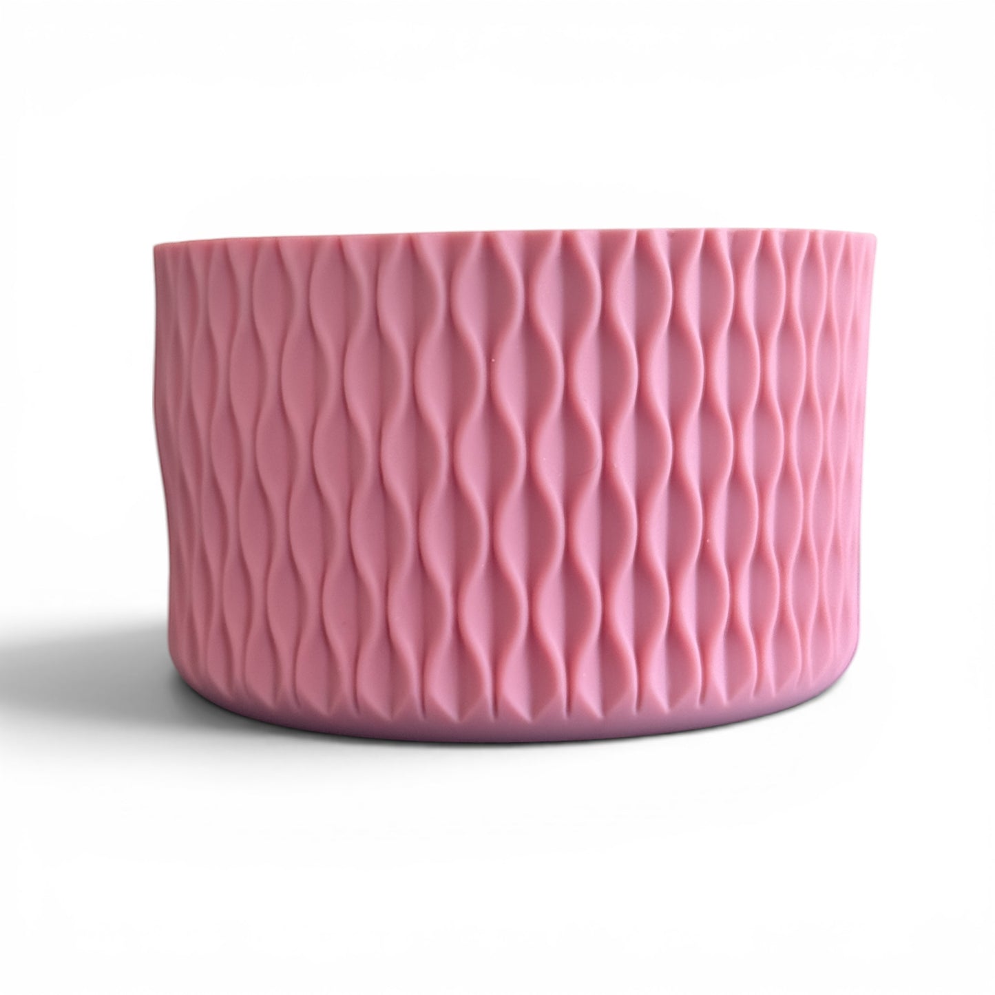 Next Nirvana antique pink silicone tumbler boot with a 3D matte wave texture for 20-40oz insulated cups.