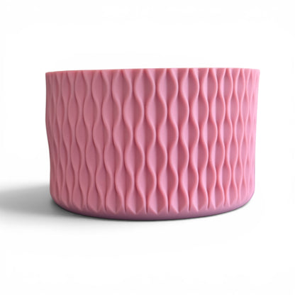 Next Nirvana antique pink silicone tumbler boot with a 3D matte wave texture for 20-40oz insulated cups.