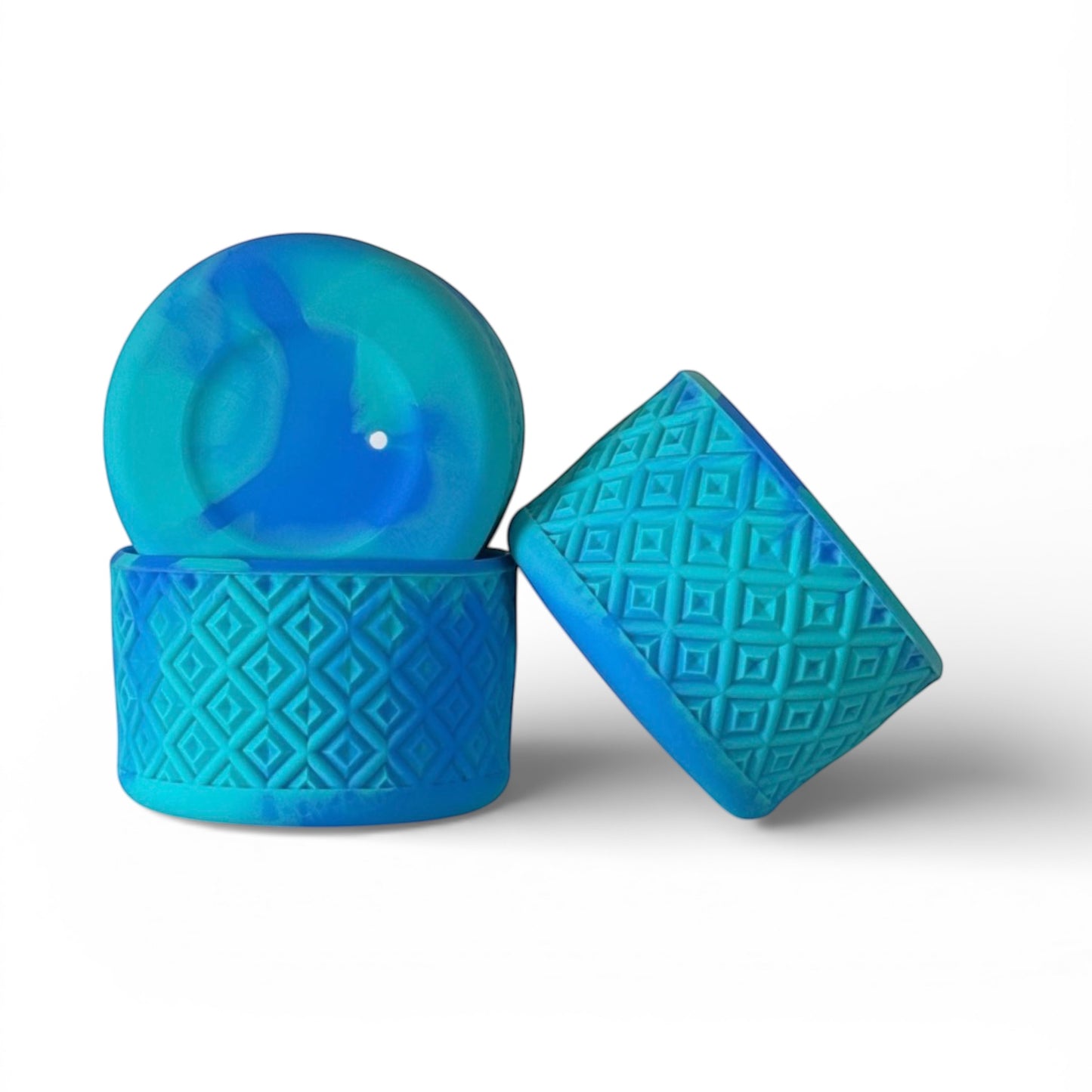 Next Nirvana aquamarine swirl silicone tumbler boot with a textured diamond pattern for protective cup base coverage.
