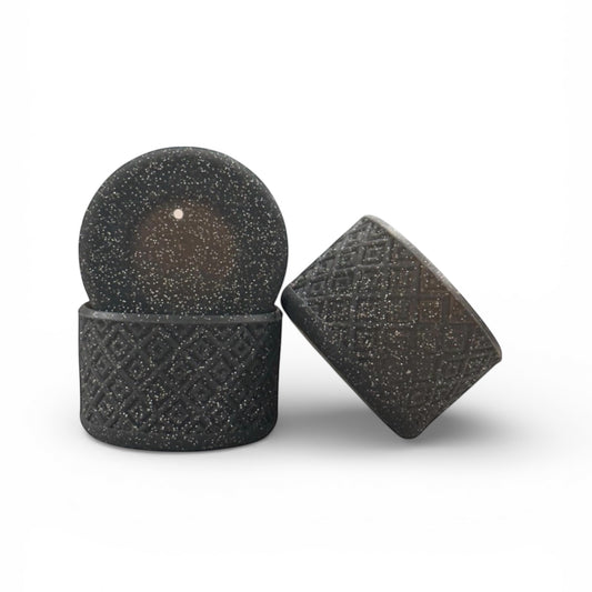 Next Nirvana black silicone tumbler boot with a textured diamond pattern and glitter finish for protective grip.
