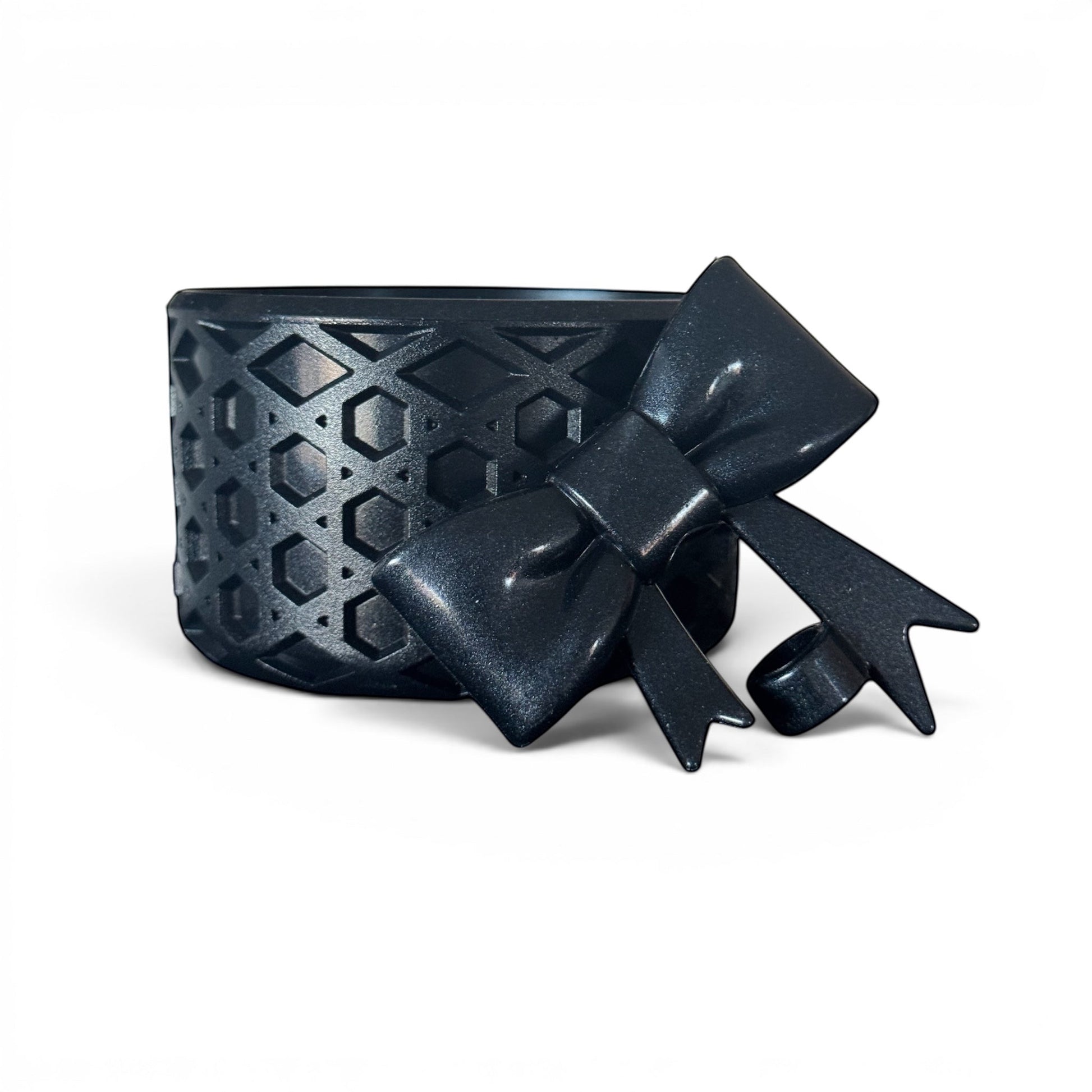 Next Nirvana Black Ice shimmer waffle-textured silicone tumbler boot and 3D bow straw topper set for insulated cups.