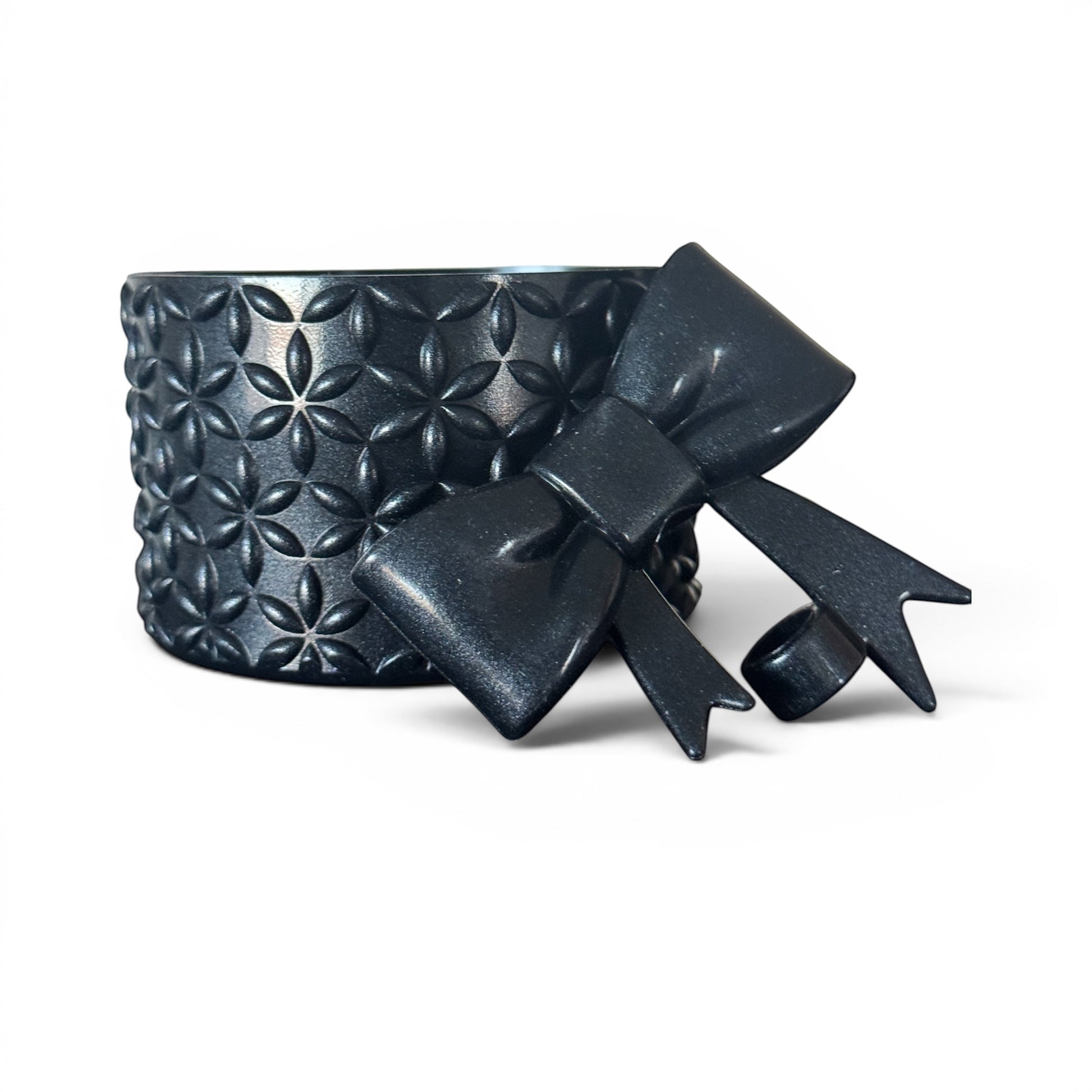 Next Nirvana black shimmer silicone tumbler boot and 3D bow straw topper set with floral textured pattern
