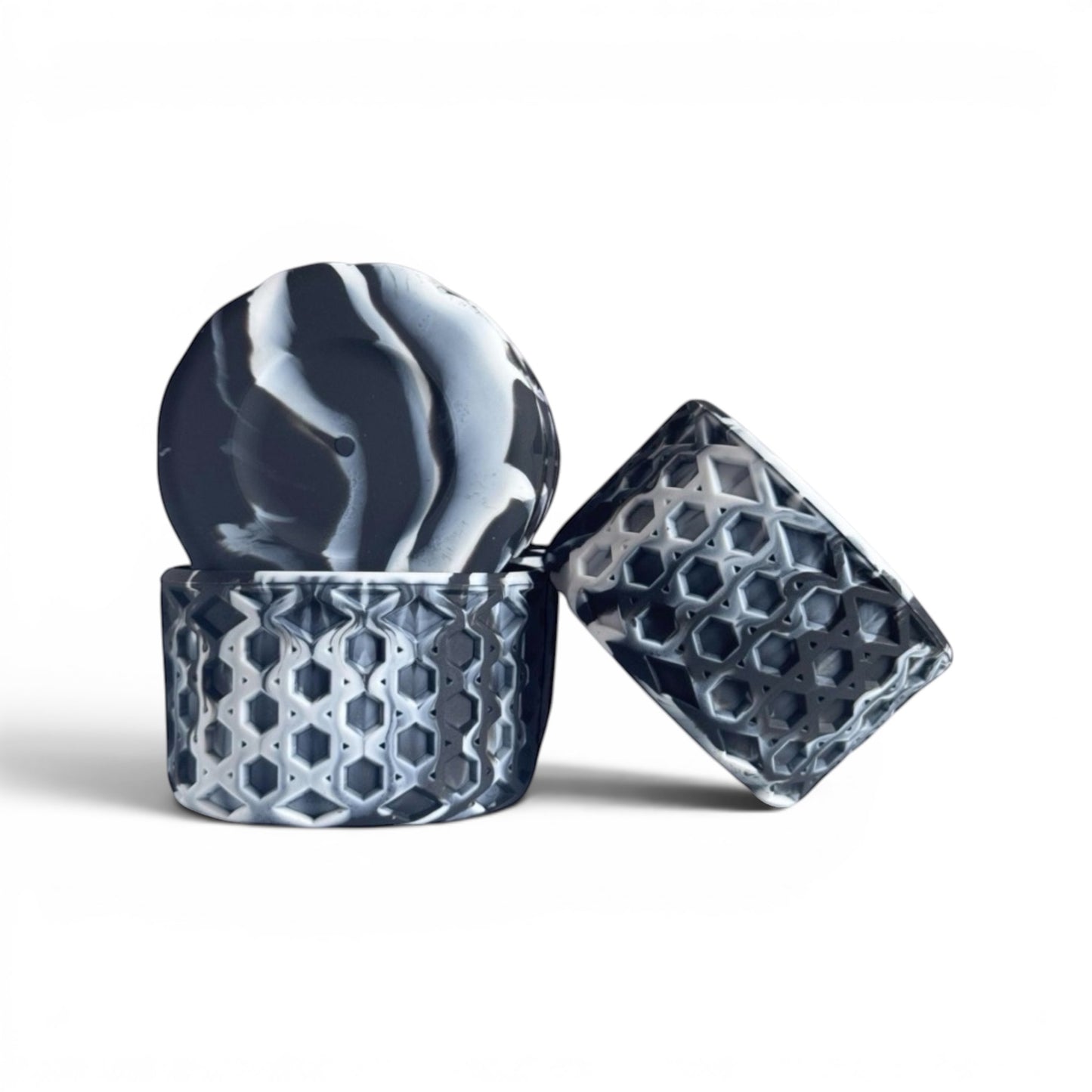 Next Nirvana black and white marble silicone tumbler boot with a 3D waffle texture for non-slip protection.