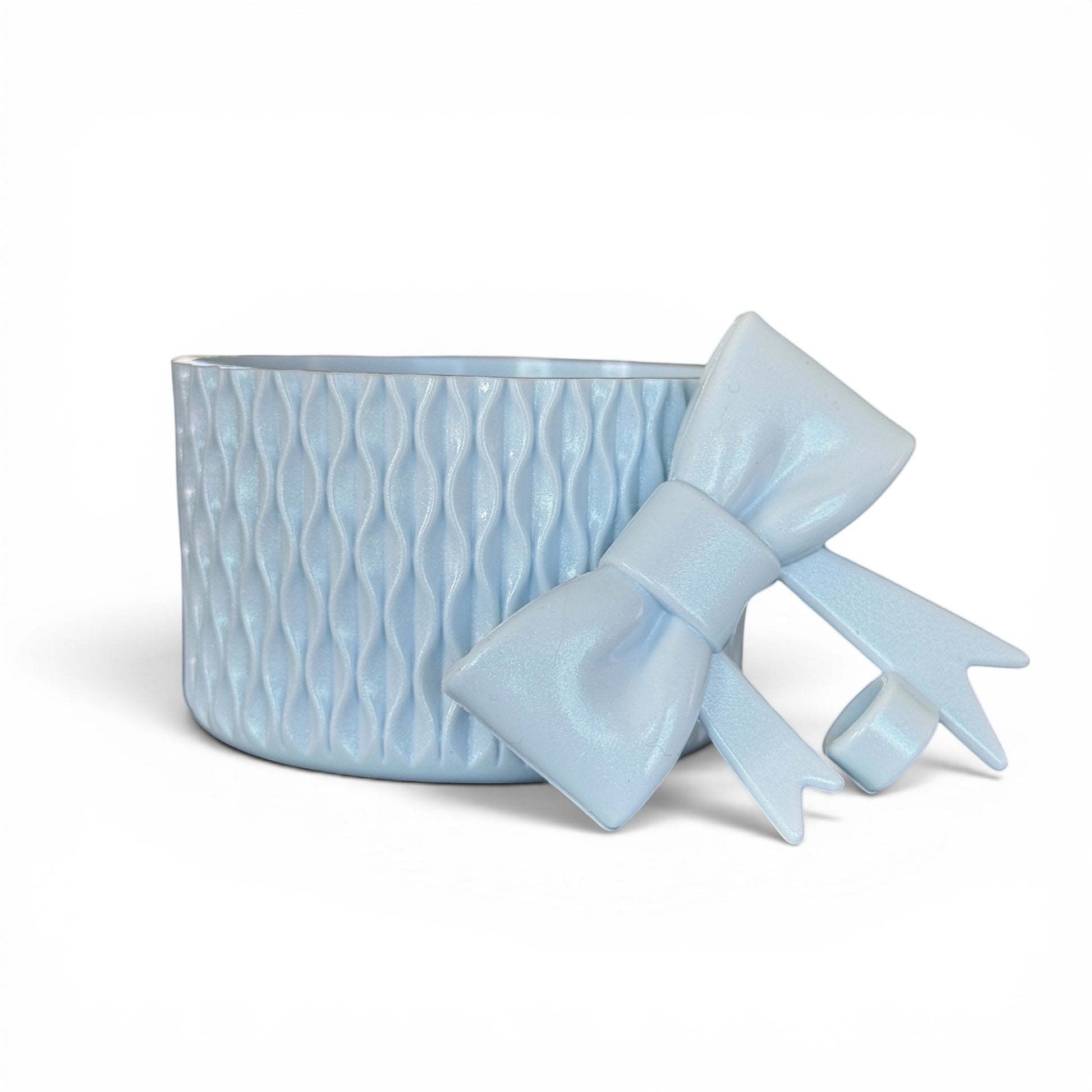 Next Nirvana light blue shimmer silicone tumbler boot with matching 3D bow straw topper for 20-40oz drinkware.