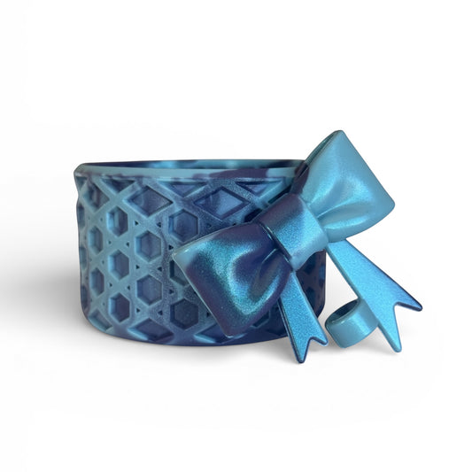 Next Nirvana blue agave shimmer waffle texture silicone tumbler boot with matching 3D bow straw topper