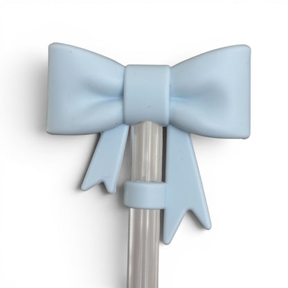 Next Nirvana light blue silicone 3D bow straw topper for tumblers, featuring a matte finish and cute bow design.