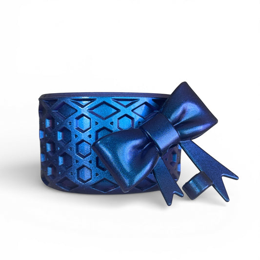 Next Nirvana blue waffle-textured silicone tumbler boot and matching 3D bow straw topper set for insulated drinkware