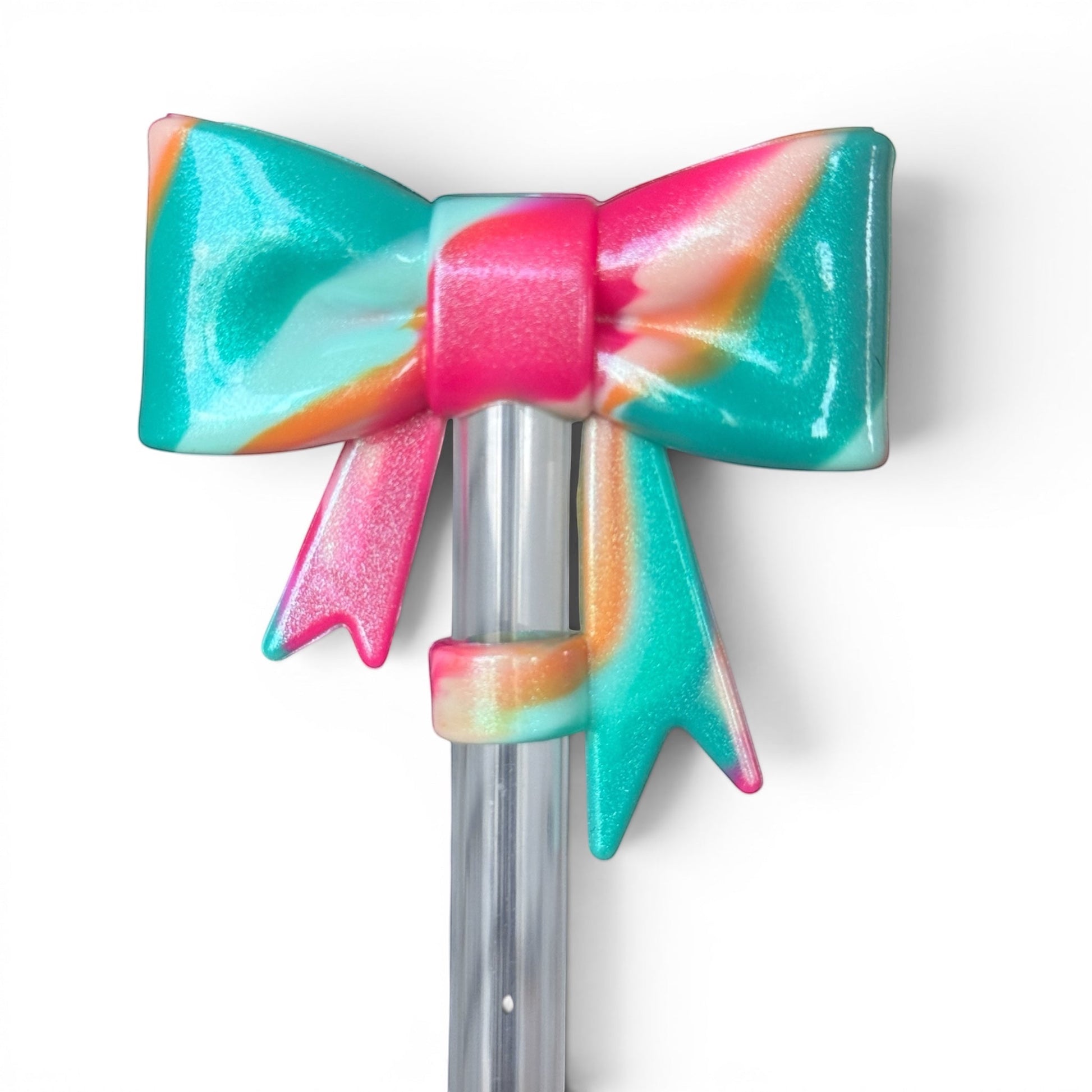 Next Nirvana Cabana Crush shimmer 3D silicone bow straw topper in a vibrant teal, pink, and orange swirl design.