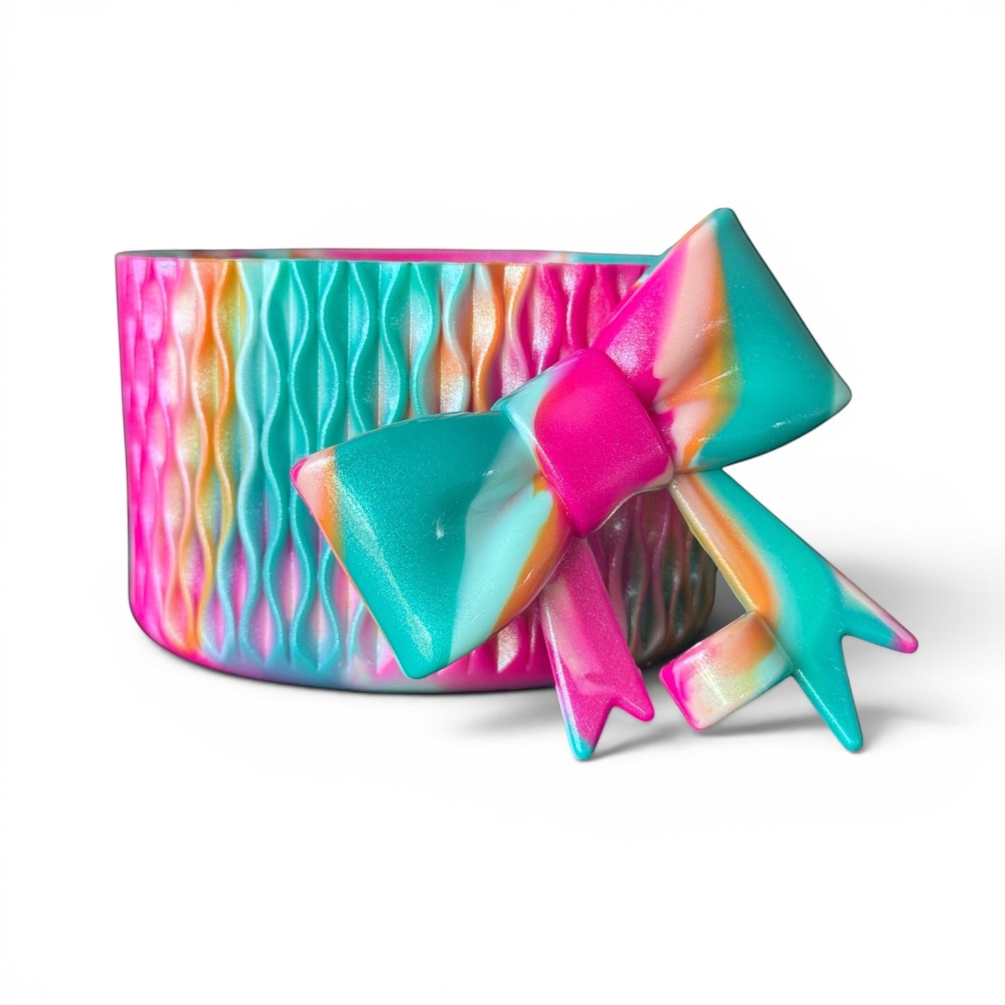 Next Nirvana Cabana Crush shimmer silicone tumbler boot and 3D bow straw topper in a vibrant multi-color wave pattern.