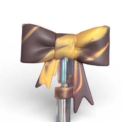 Next Nirvana chocolate and gold 3D bow silicone straw topper for tumblers