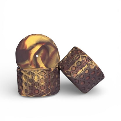 Next Nirvana chocolate gold waffle-textured silicone tumbler boot and 3D bow straw topper set for insulated cups.