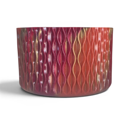 Next Nirvana Country Gold Waves silicone tumbler boot with a red and gold textured wave pattern for 20-40oz tumblers.