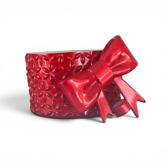 Next Nirvana Crimson Crush holographic red silicone tumbler boot and 3D bow straw topper with floral texture.