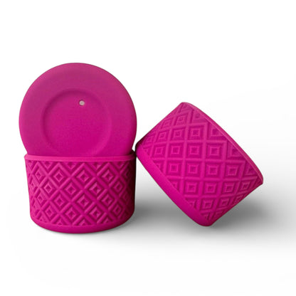 Next Nirvana fuchsia silicone tumbler boot with a textured diamond pattern for protective non-slip grip