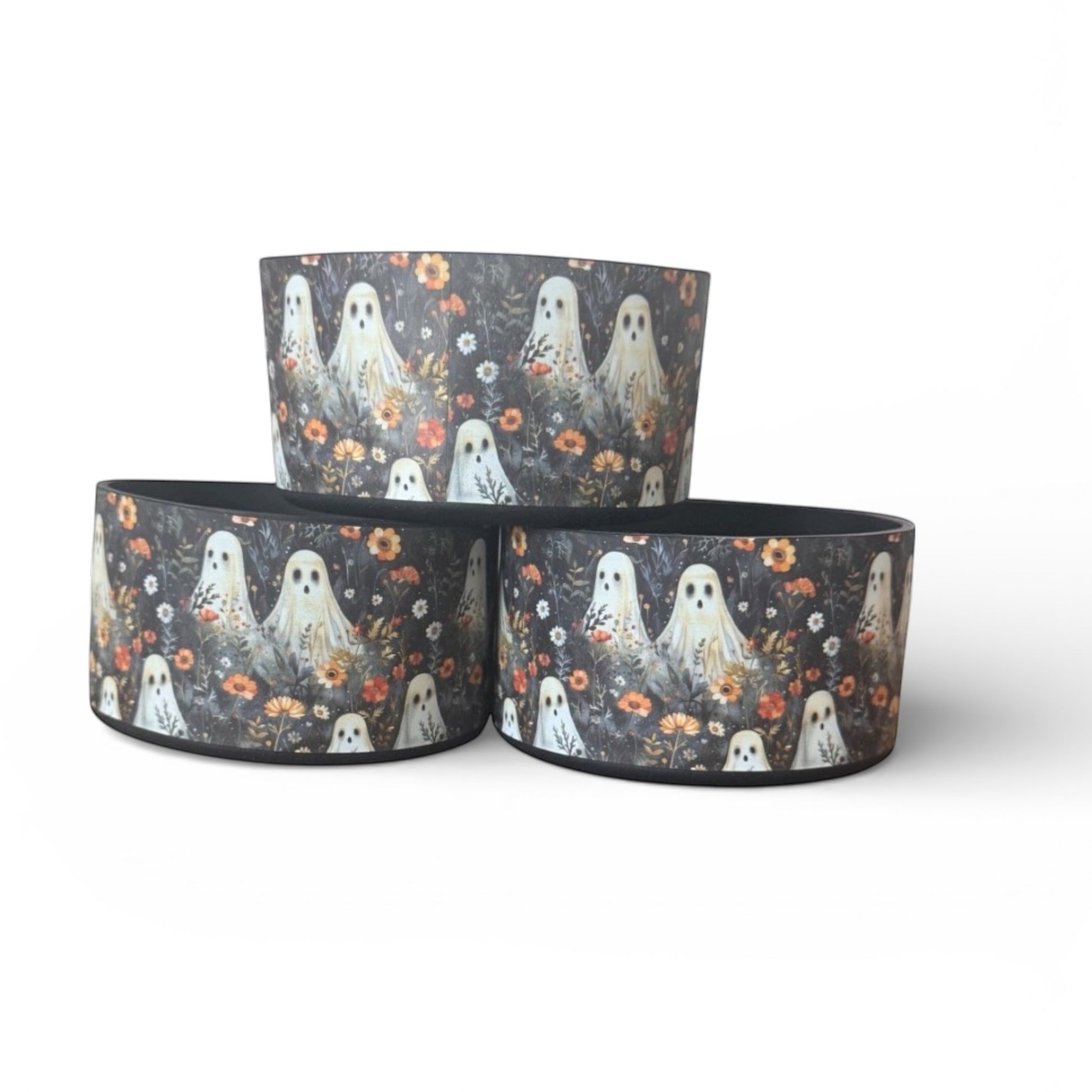 Next Nirvana silicone tumbler boot featuring a spooky ghost and floral pattern on a dark background for Stanley tumblers.