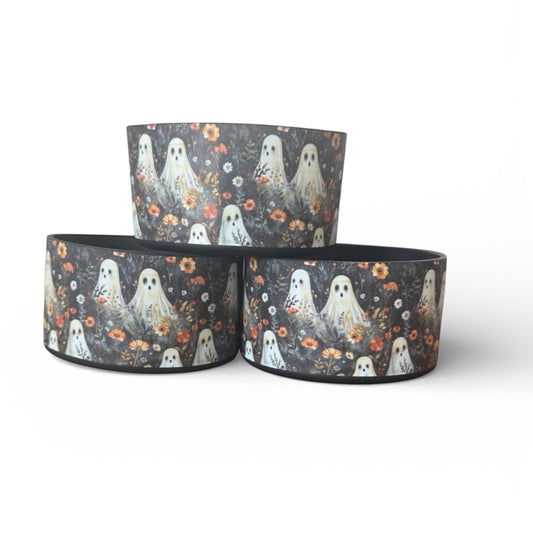 Next Nirvana silicone tumbler boot featuring a spooky ghost and floral pattern on a dark background for Stanley tumblers.