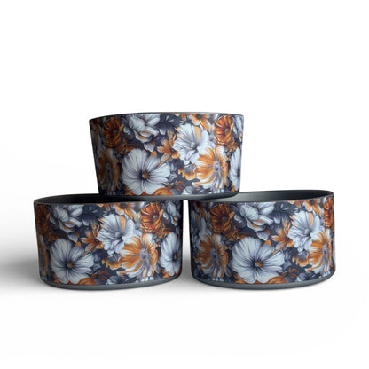 Next Nirvana Golden Bloom silicone tumbler boot with floral pattern in orange and grey for Stanley and other tumblers