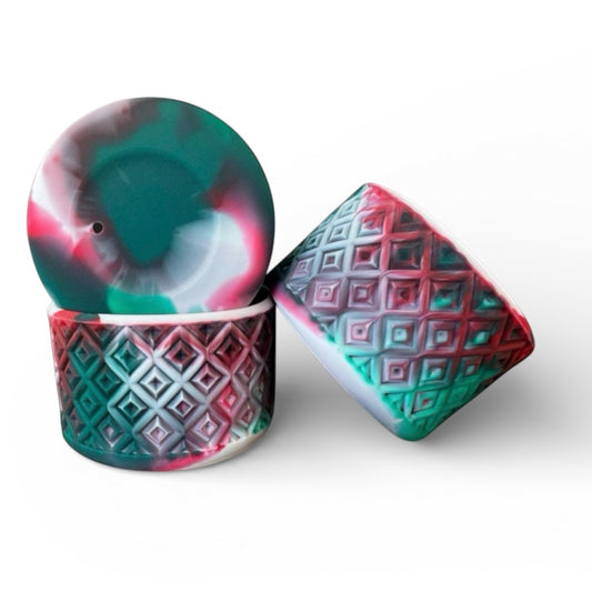 Next Nirvana Holiday Spirit diamond-textured silicone tumbler boot in a red, green, and white swirl pattern.