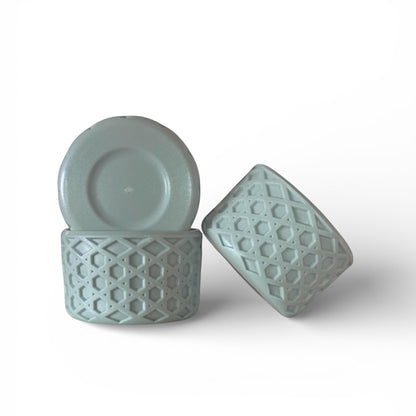 Next Nirvana light gray shimmer silicone tumbler boot with a textured waffle pattern for non-slip protection.
