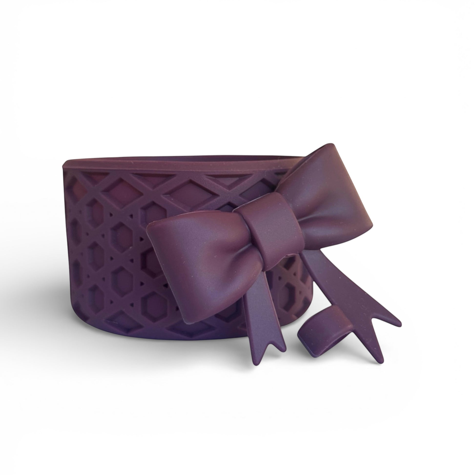 Next Nirvana matte dark purple silicone tumbler boot with waffle texture and matching 3D bow straw topper accessory.