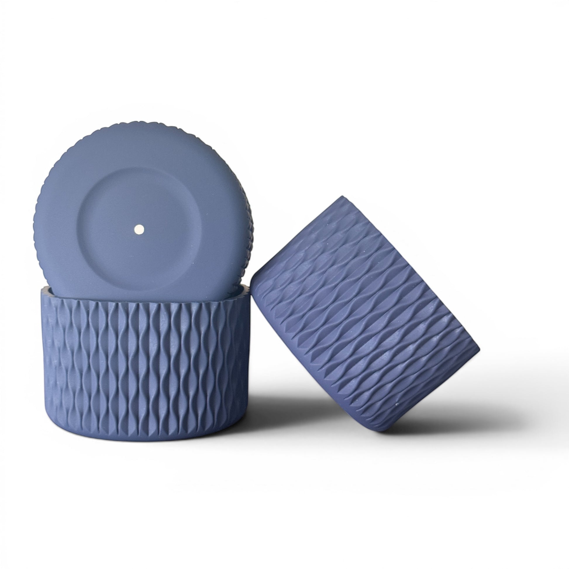Next Nirvana navy matte silicone tumbler boot set with 3D wave texture for 20-40oz insulated cups.