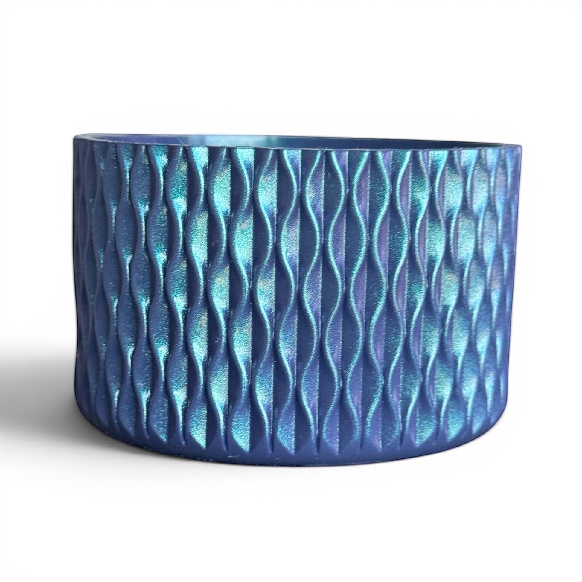Next Nirvana navy blue shimmer silicone tumbler boot with 3D wave texture for 20-40oz insulated cups.