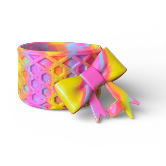 Next Nirvana neon 90s style waffle textured silicone tumbler boot and matching 3D bow straw topper set