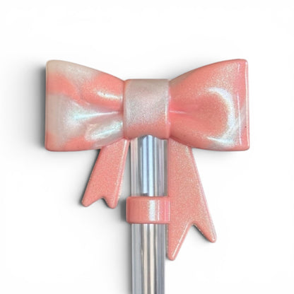 Next Nirvana Peach Bellini 3D silicone bow straw topper in a shimmery pink and white marbled finish.