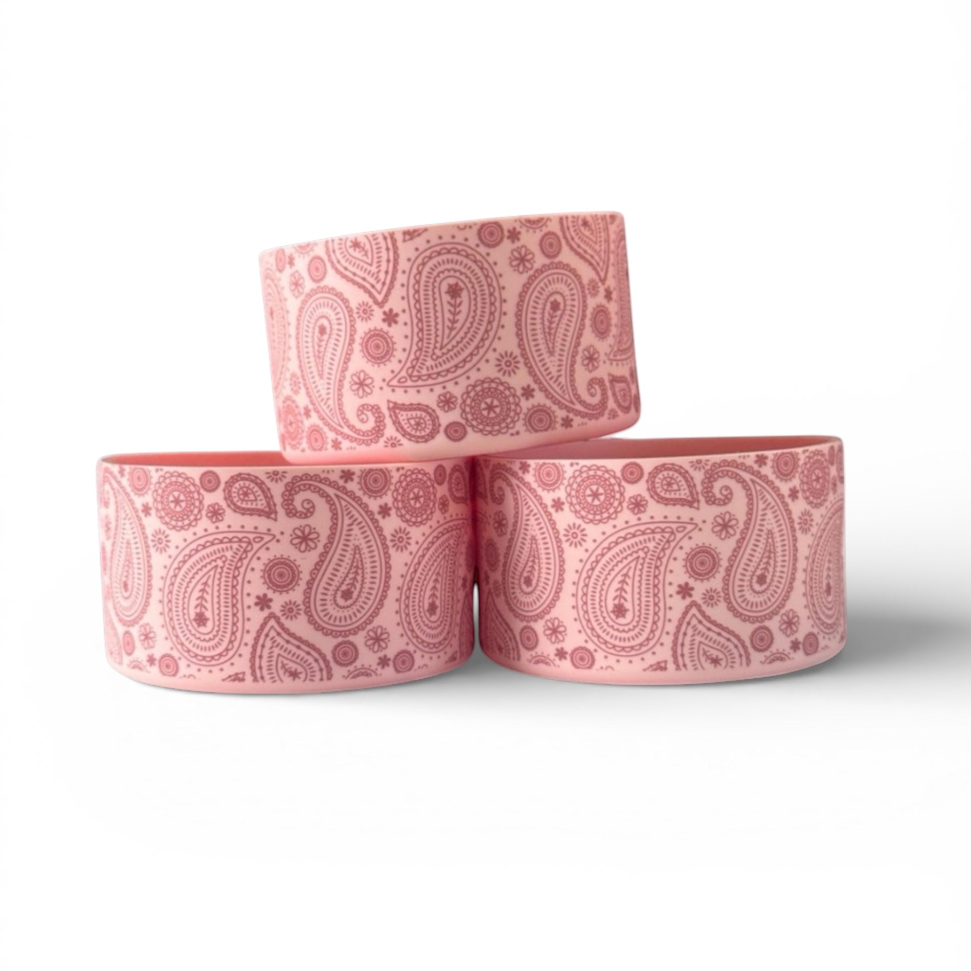 Next Nirvana pink silicone tumbler boot with a decorative paisley pattern for protective non-slip cup base