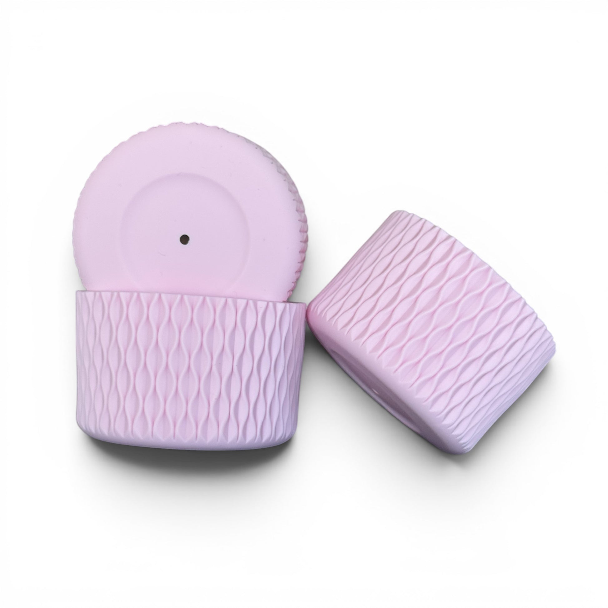 Next Nirvana matte pink silicone tumbler boot and 3D wave textured straw topper set for 20-40oz insulated cups.