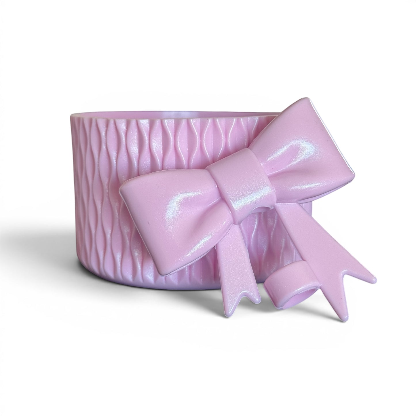 Next Nirvana pink shimmer silicone tumbler boot and 3D bow straw topper set with textured wave design