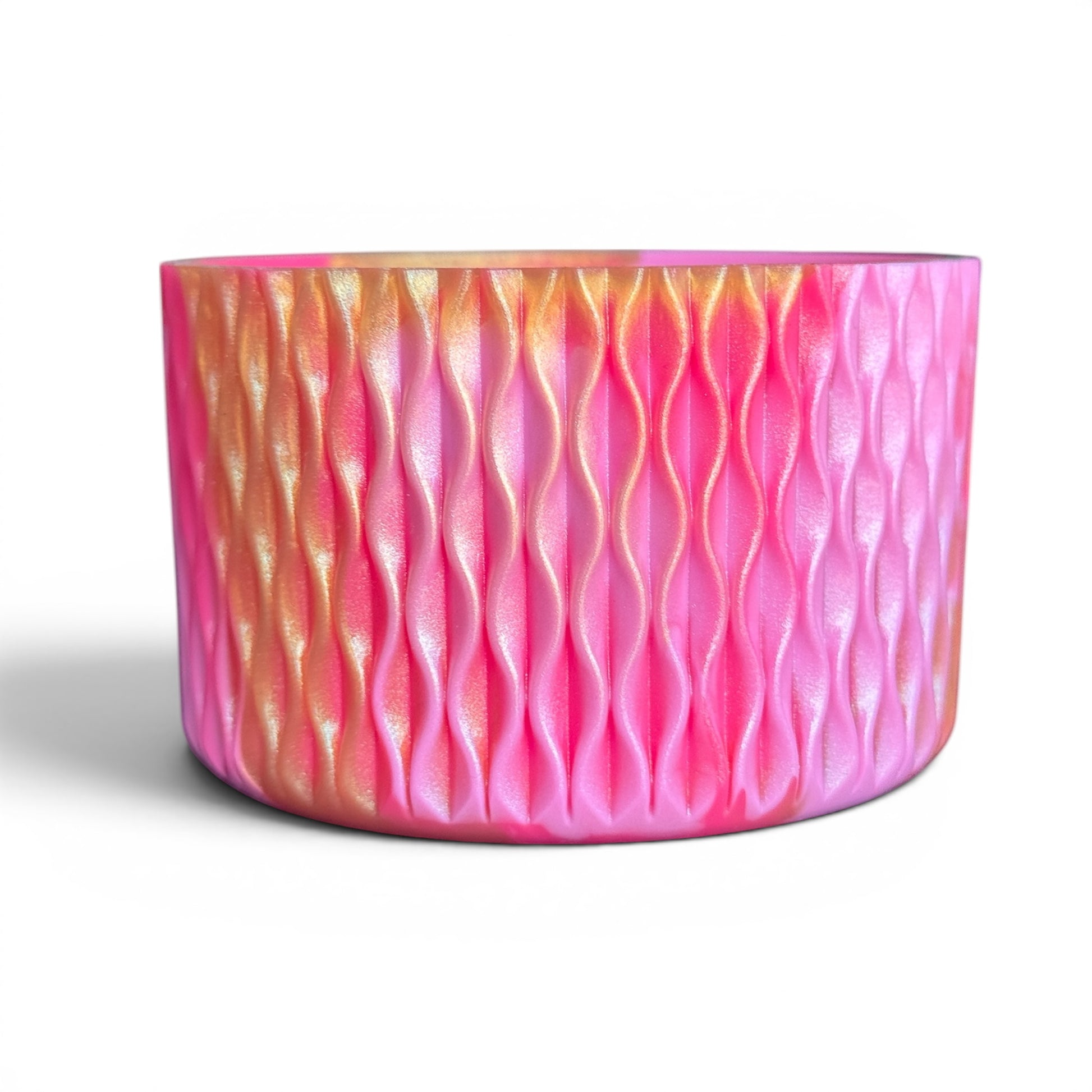 Next Nirvana pink and gold shimmer silicone tumbler boot with a 3D wave texture for 20-40oz insulated cups.