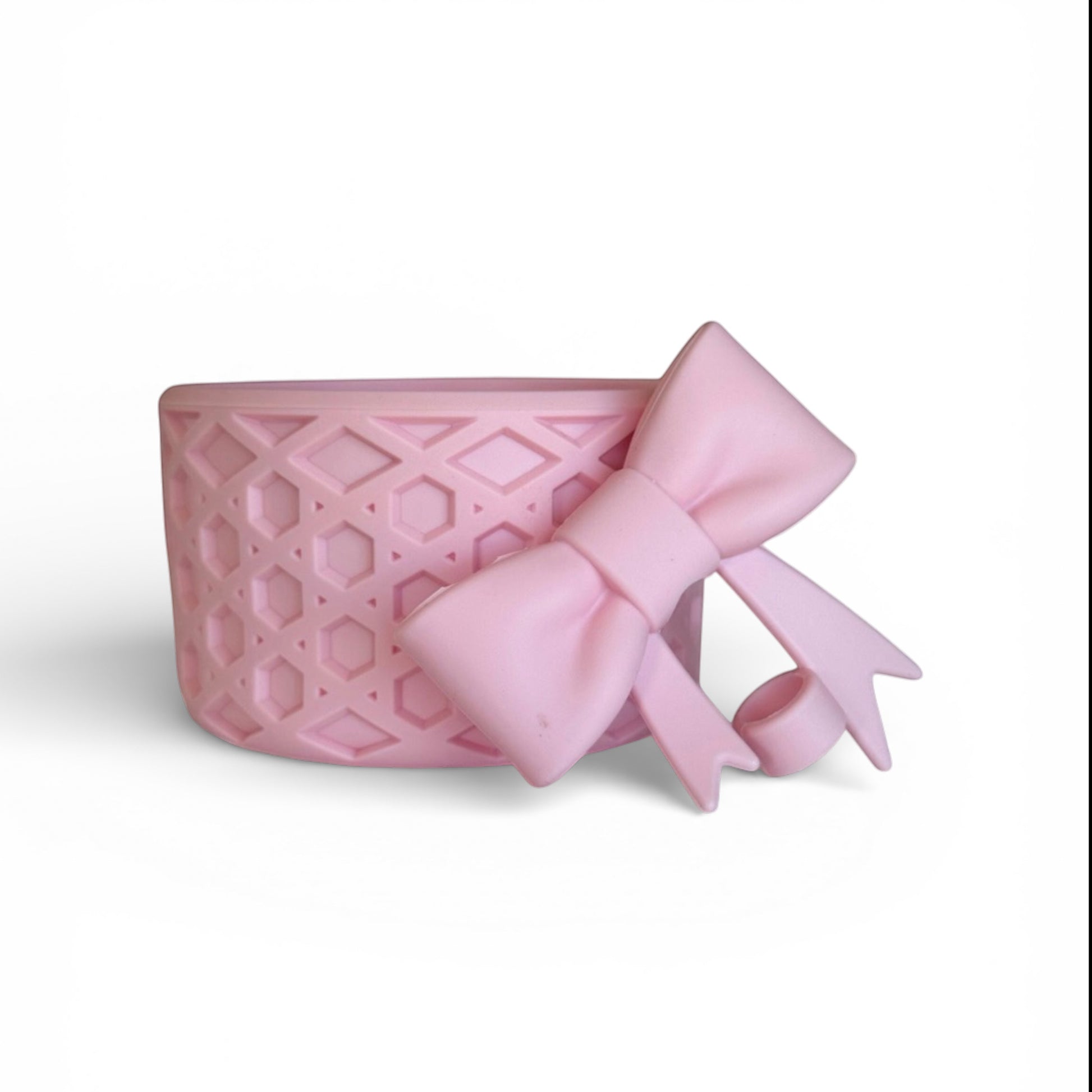 Next Nirvana matte rose pink silicone tumbler boot with waffle texture and matching 3D bow straw topper accessory.