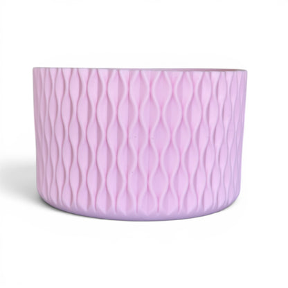 Next Nirvana matte pink silicone tumbler boot with a 3D wave texture for 20-40oz insulated drinkware protection.