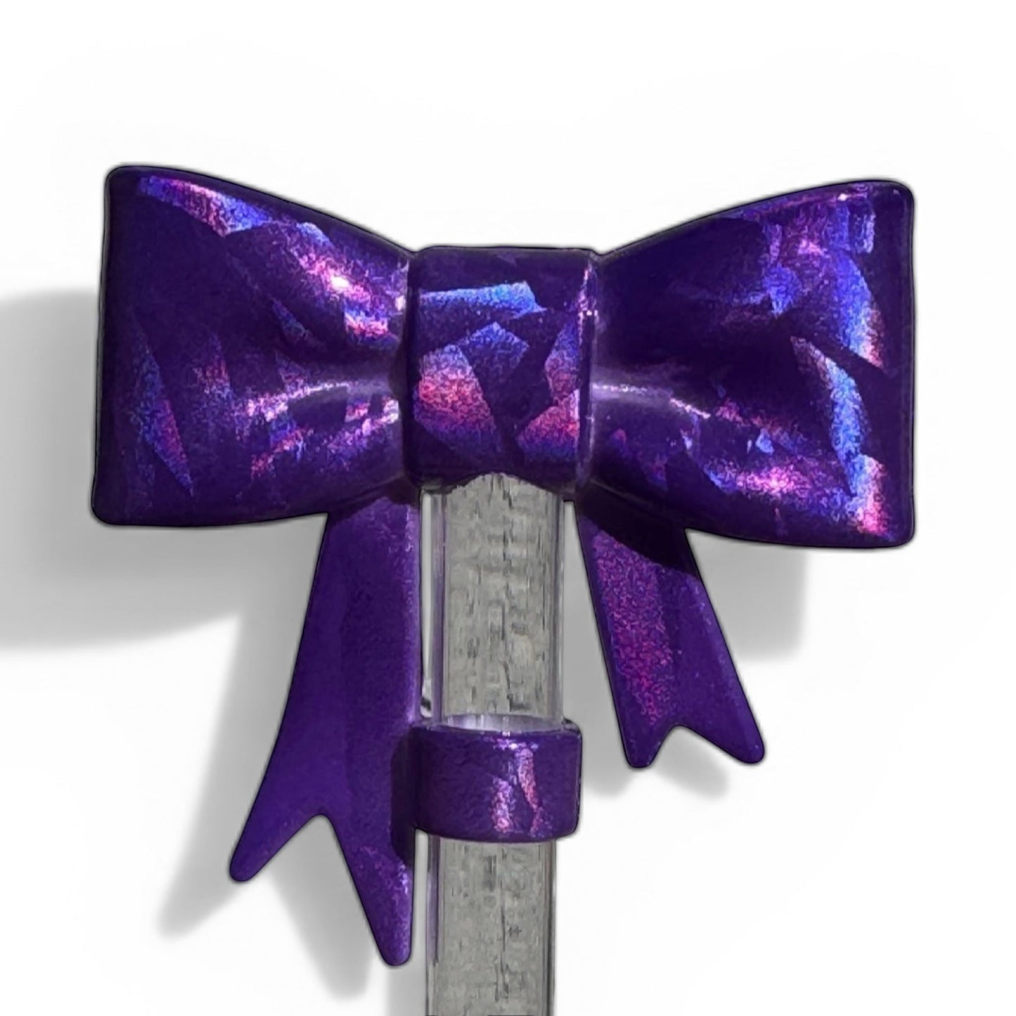 Next Nirvana purple holographic 3D bow straw topper for tumblers with a shimmering geometric finish