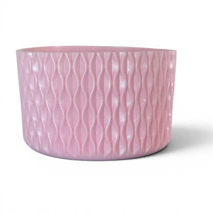 Next Nirvana rose pink shimmer silicone tumbler boot with a 3D wave texture for 20oz to 40oz insulated cups.
