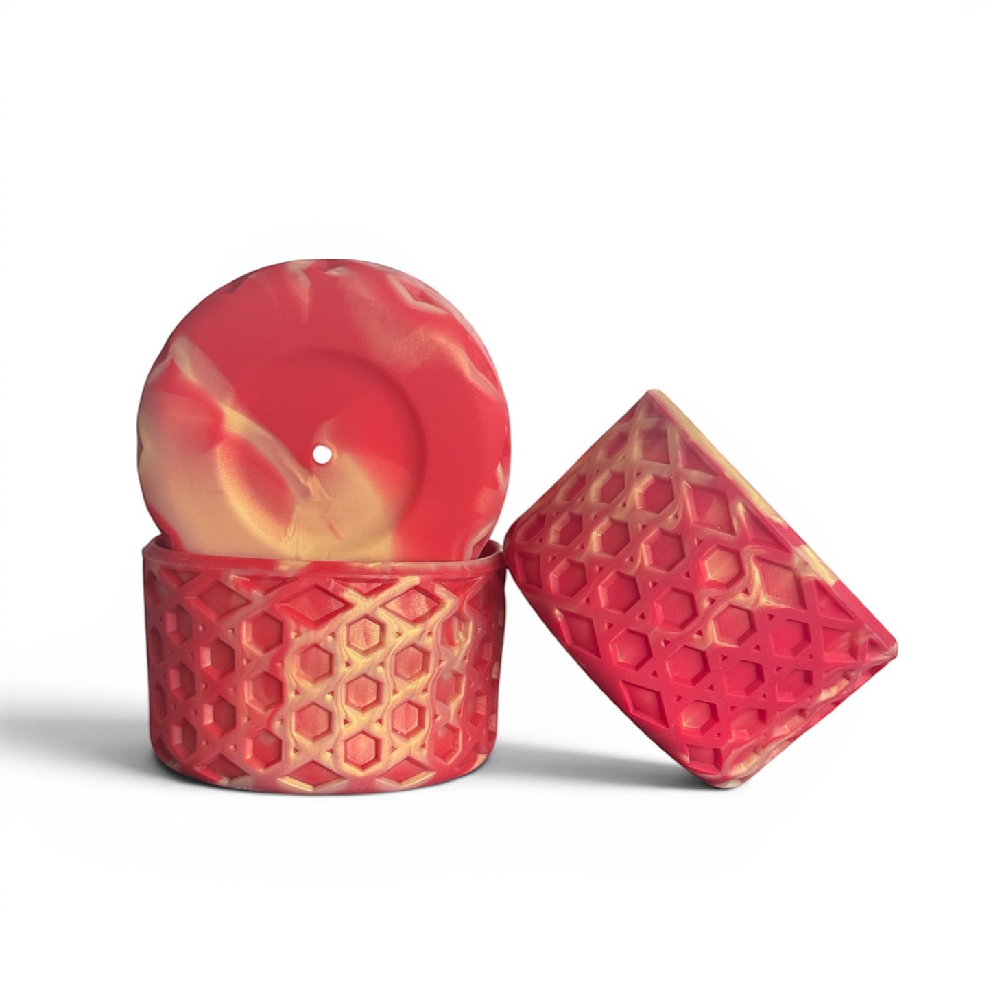 Next Nirvana Scarlet Afterglow waffle-textured silicone tumbler boot in red and cream swirl for Stanley cups.