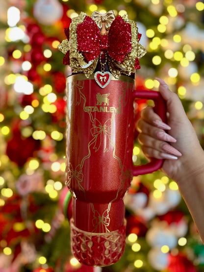 Next Nirvana Scarlet Afterglow waffle silicone tumbler boot on a red Stanley cup with a festive holiday bow