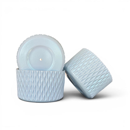 Next Nirvana shimmer light blue silicone tumbler boots with a 3D wave texture for 20-40oz drinkware protection.