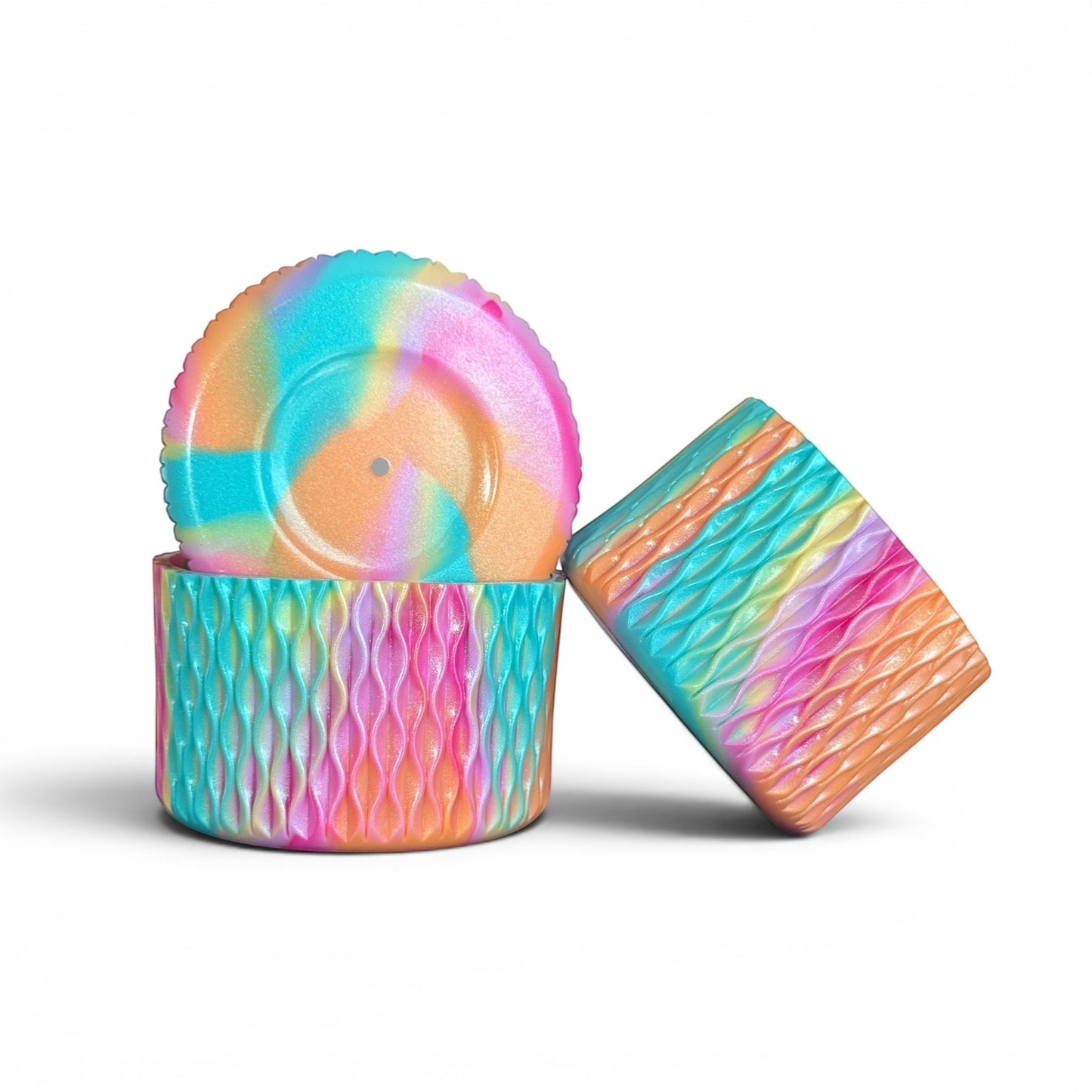 Next Nirvana Summer Splash silicone tumbler boot and 3D bow straw topper set in a shimmering rainbow wave pattern.