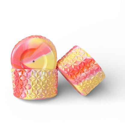 Next Nirvana Summer Heat Shimmer silicone tumbler boot and 3D floral textured straw topper set in pink and yellow