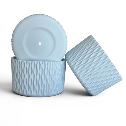 Next Nirvana matte light blue silicone tumbler boot and matching 3D wave textured straw topper set.