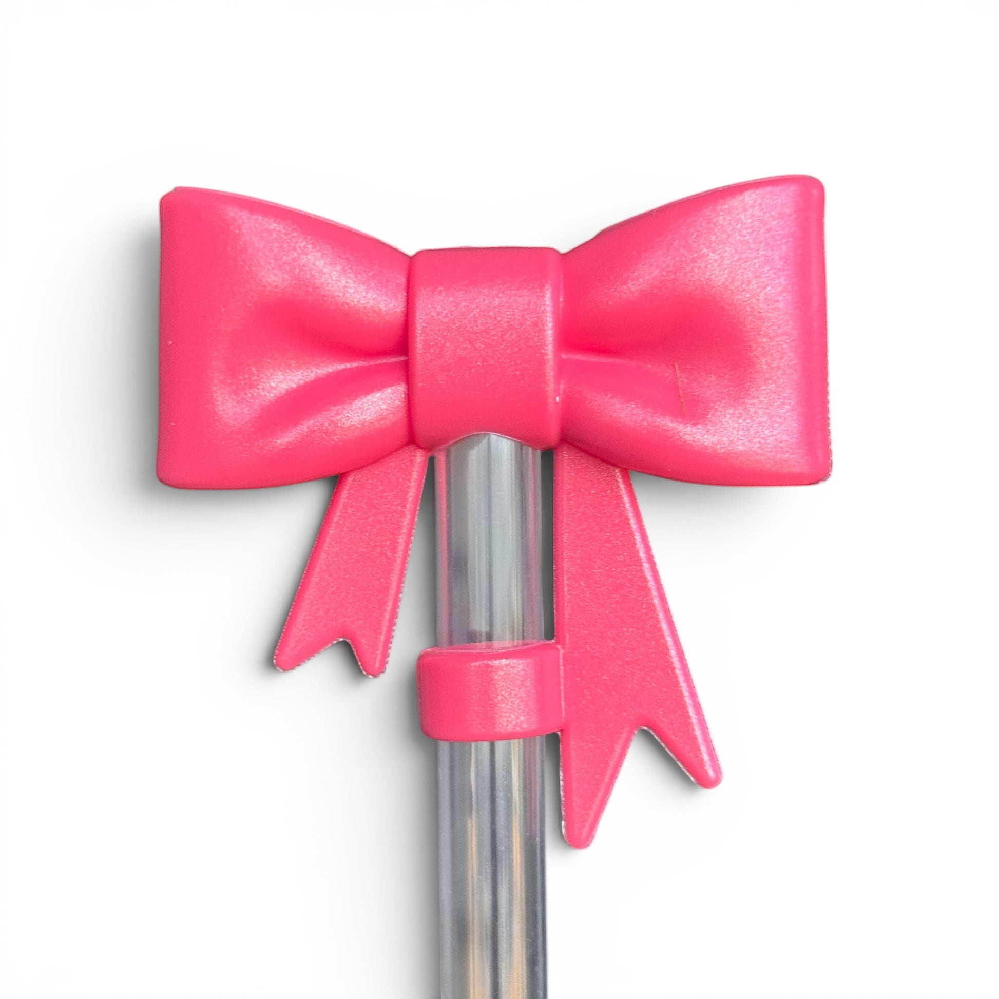 Next Nirvana Slayberry Punch shimmer pink 3D silicone bow straw topper for tumblers on a clear straw