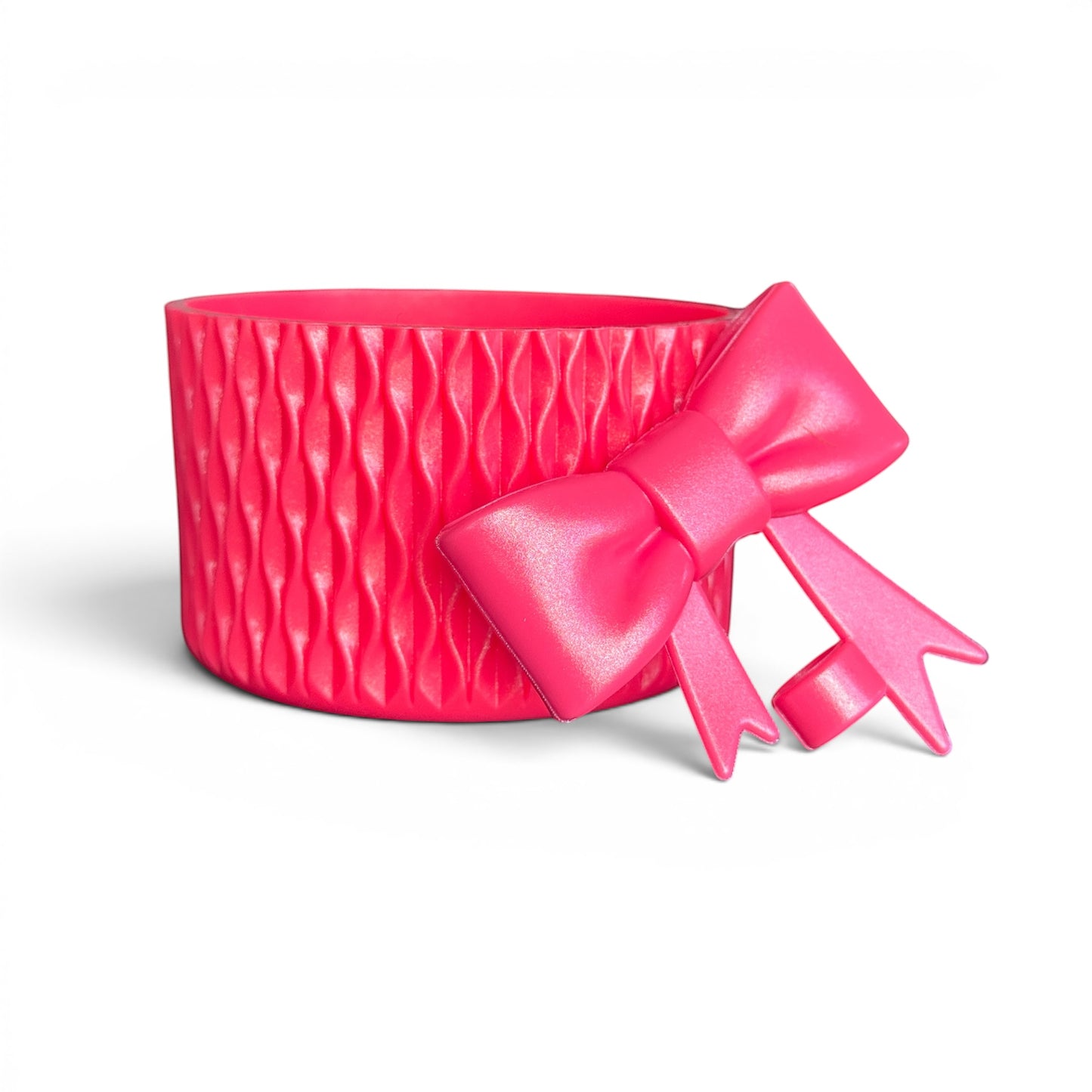 Next Nirvana Slayberry Punch shimmer pink silicone tumbler boot with matching 3D bow straw topper for drinkware.