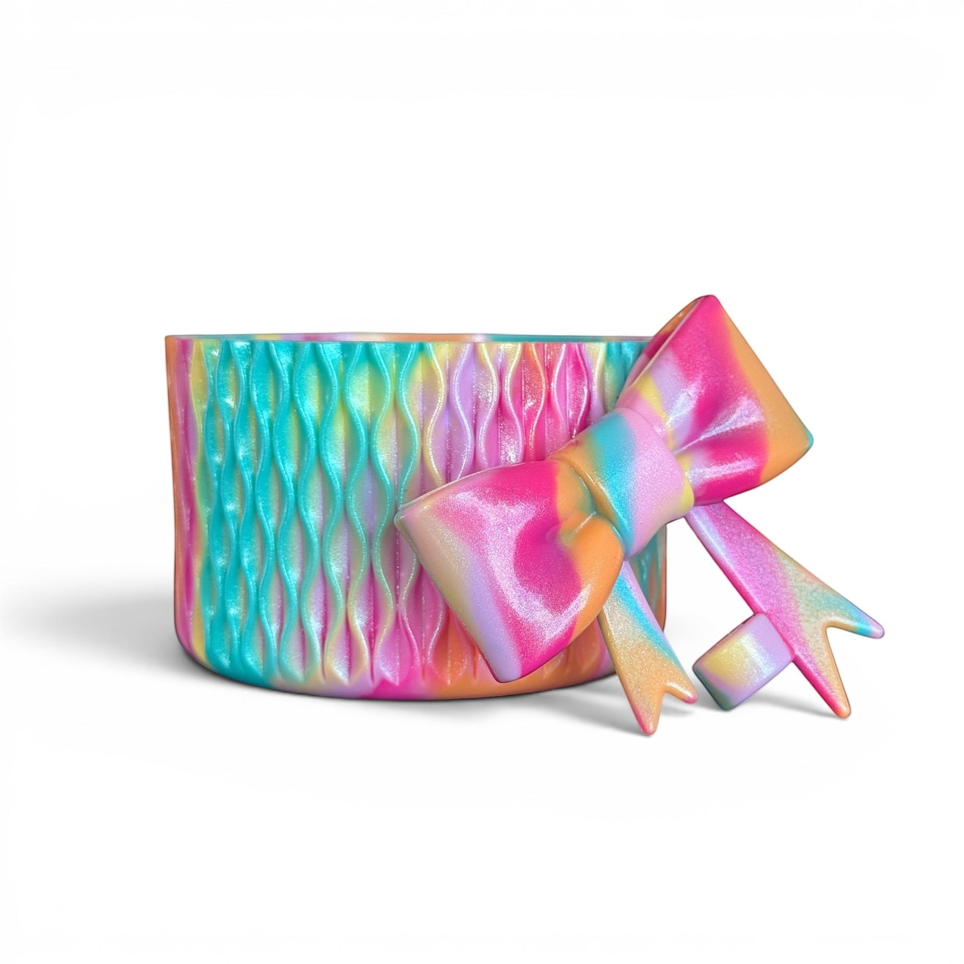 Next Nirvana Summer Splash shimmer silicone tumbler boot and matching 3D bow straw topper in a vibrant rainbow swirl.