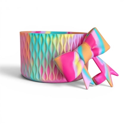 Next Nirvana Summer Splash silicone tumbler boot and 3D bow straw topper set in a vibrant multi-color wavy design.