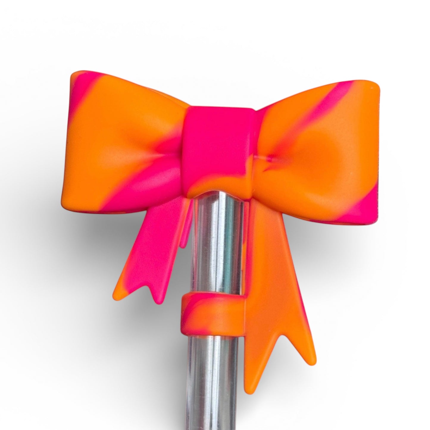 Next Nirvana Summer Sunset silicone 3D bow straw topper in vibrant orange and pink swirl pattern