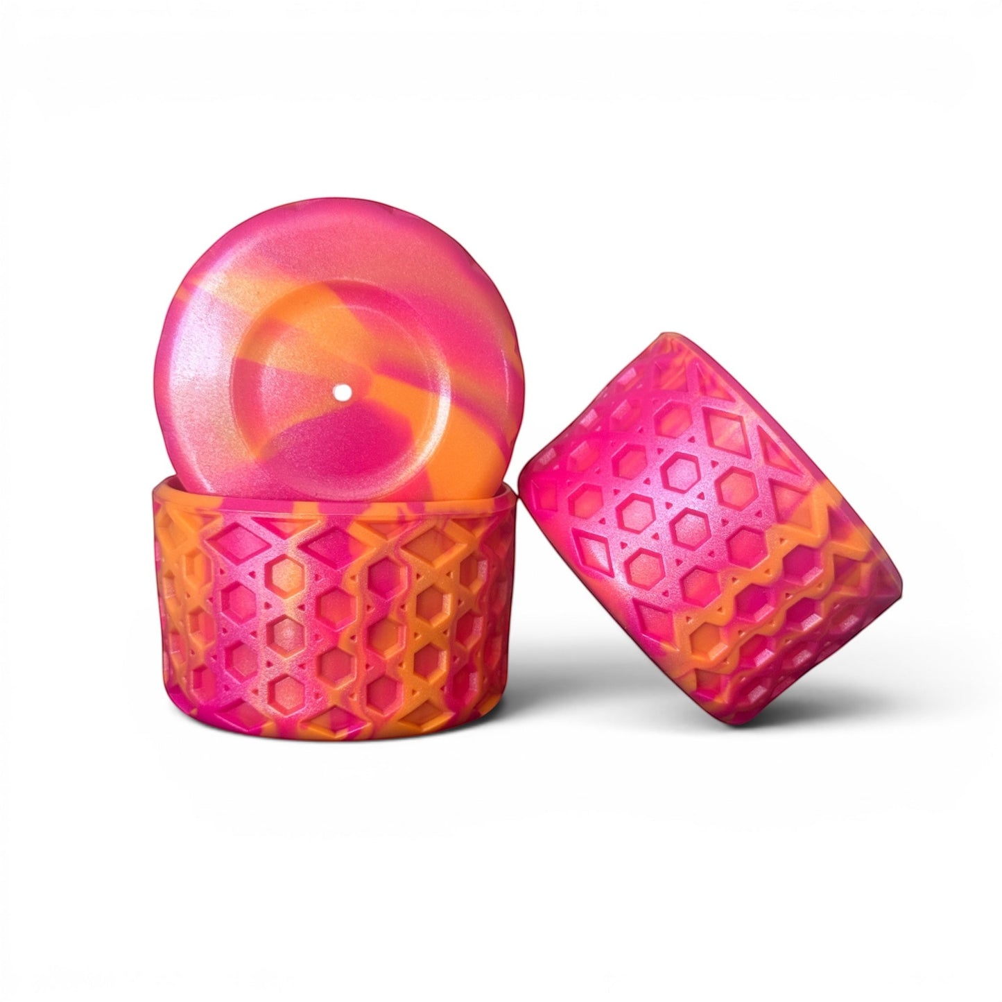 Next Nirvana Summer Sunset shimmer silicone waffle tumbler boot with a textured non-slip design in pink and orange.